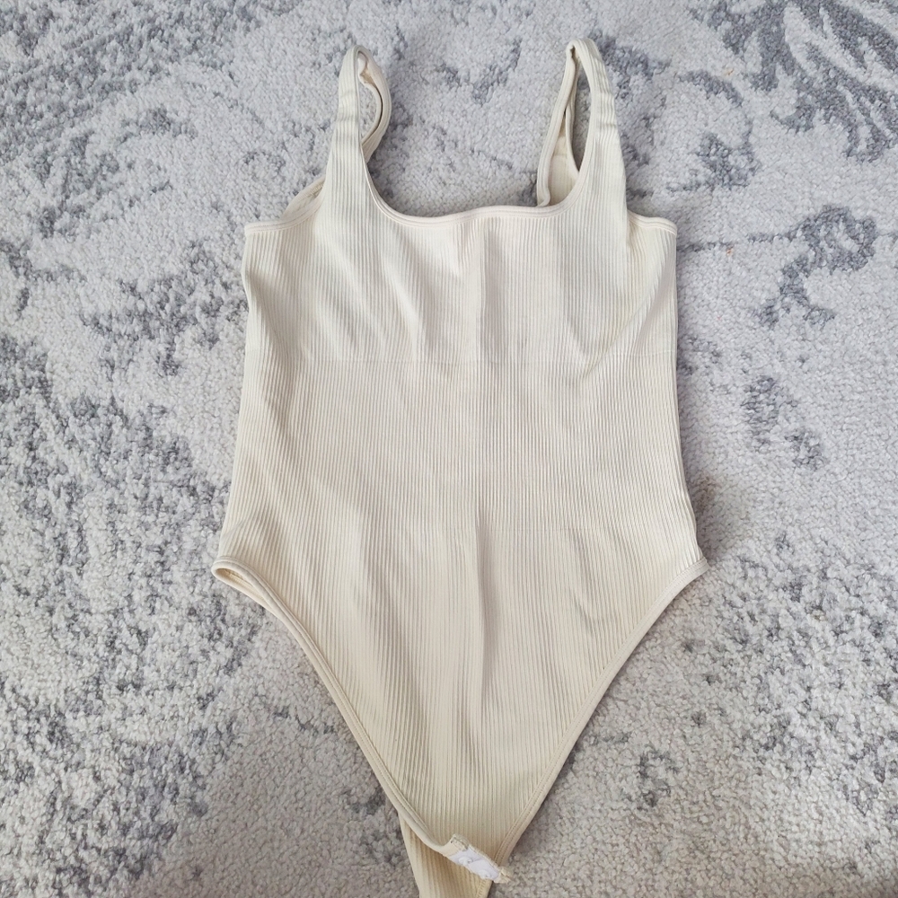 OQQ Cream Ribbed Bodysuit